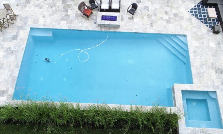 corner steps fiberglass pool with raised spa in Verona NJ, pool installer