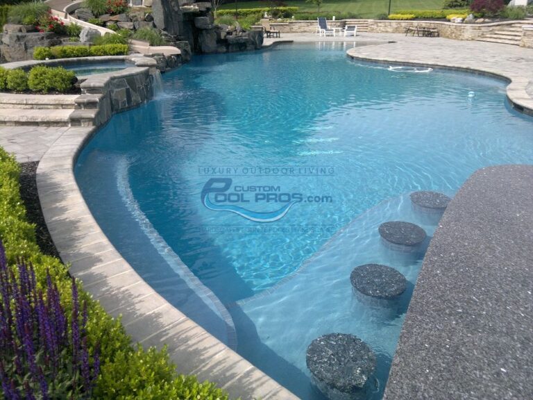 swim up bar in freeform inground pool, spa, slide, waterfall, pool installer