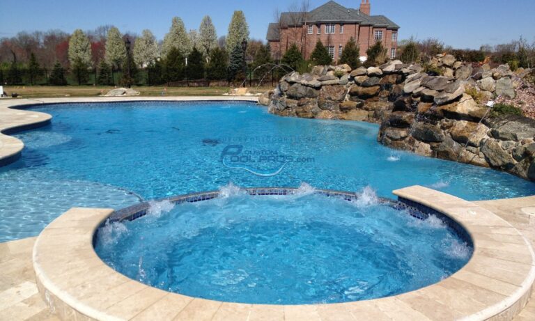 inground pool with spa, rock wall backyard installation, pool builder nj